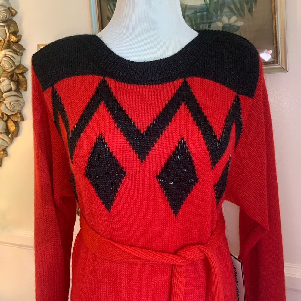 Vintage 1980’s red and black geometric sweater dress with beaded detail!